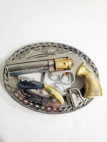 Revolver gun belt buckle with knife and grenade